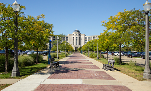 "Michigan's Hall of Justice building on sunny day"