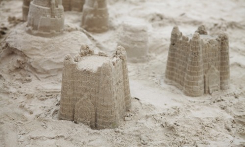 "sandcastles in sandbox"