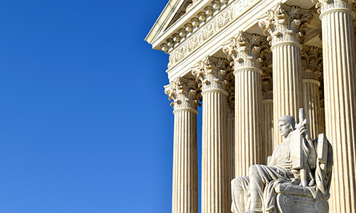 "guardian statue in front of U.S. Supreme Court building"