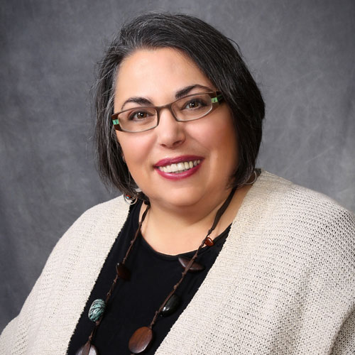 "headshot of black-haired woman"