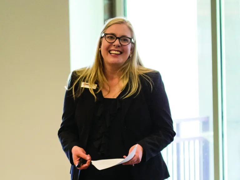 CEO Brittany Kauffman speaking to group