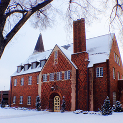 red brick building in snow
