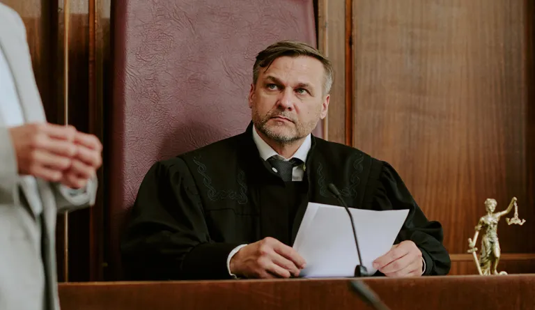 A judge sitting on the bench hearing a case