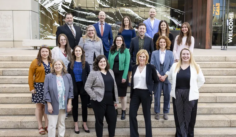 IAALS staff standing on stairs