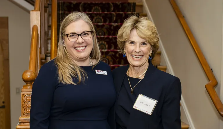 Brittany Kauffman and Rebecca Love Kourlis smiling at John Moye Hall 