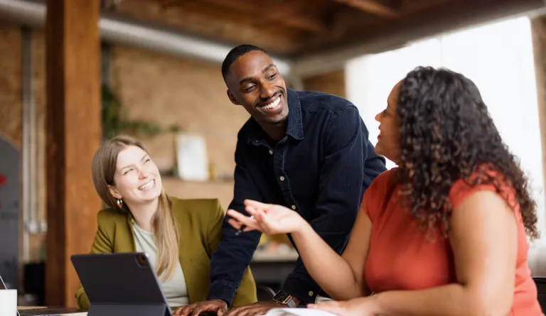 People in an office collaborating. 