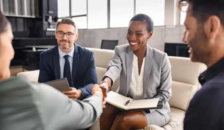 business people shaking hands during meeting