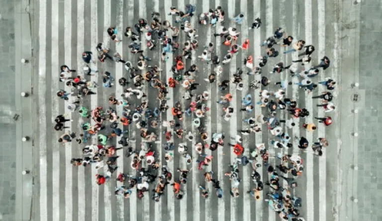 high angle view of people forming a speech bubble