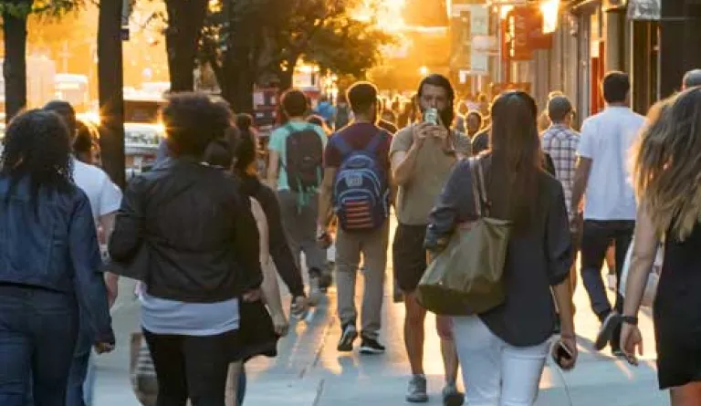 people walking in a town