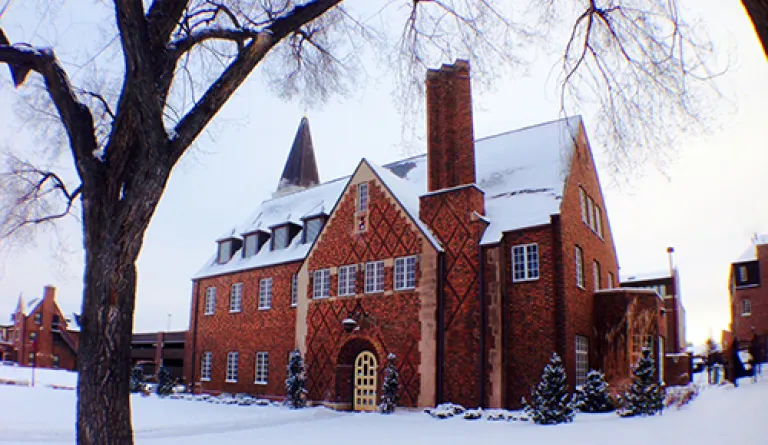red brick building in snow