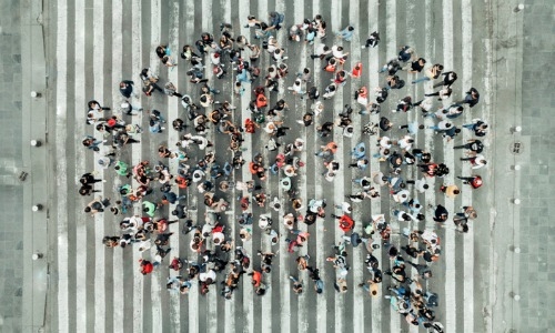 high angle view of people forming a speech bubble