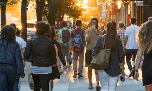 people walking in a town