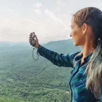 woman using a compass