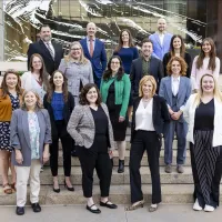 IAALS staff standing on stairs