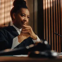 A judge with clasped hands