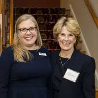 Brittany Kauffman and Rebecca Love Kourlis smiling at John Moye Hall 