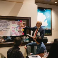 Honorable Adam J. Espinosa presenting shared work at the IAALS Uncomplicated Courts convening