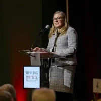 Brittany Kauffman speaking at the 2025 IAALS Rebuilding Justice Award Dinner