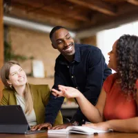 People in an office collaborating. 