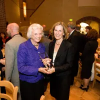 Rebecca Love Kourlis presenting Sandra Day O’Connor an award.