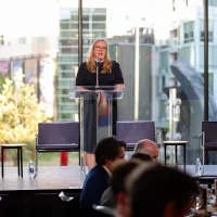 Brittany K.T. Kauffman speaking at the 2026 IAALS Rebuilding Justice Award Dinner