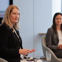 Arizona Chief Justice Timmer and Jess Bednarz speaking at the 2025 IAALS Lawyers Council Meeting