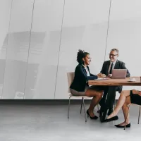 A group of people sitting at a table