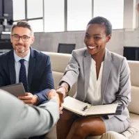 business people shaking hands during meeting