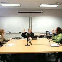 judge mediating hearing between couple