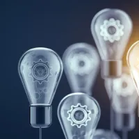 group of lightbulbs with one lit up