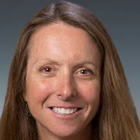 headshot of woman with long hair