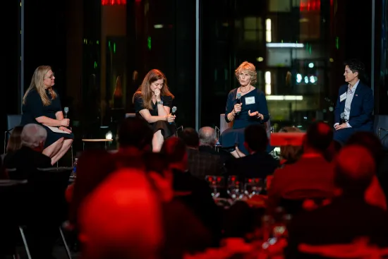 Brittany Kauffman, Rebecca Love Kourlis, Colorado Chief Justice Monica Márquez, and former Michigan Chief Justice Bridget Mary McCormack speaking at the 18th Annual Rebuilding Justice Award Dinner.