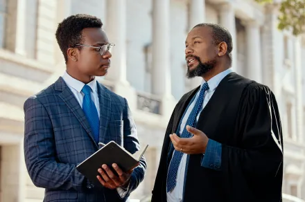 A judge and another person speaking