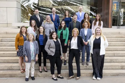 IAALS staff standing on stairs
