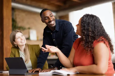 People in an office collaborating. 
