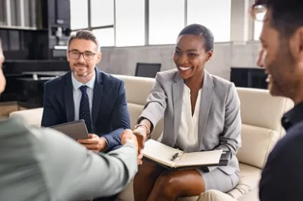 business people shaking hands during meeting