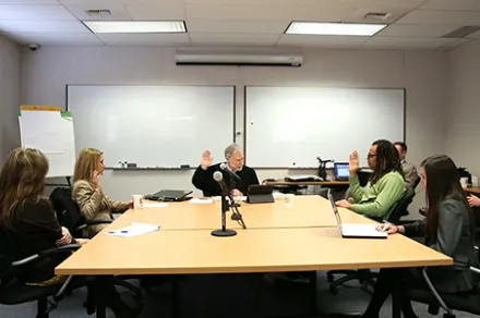 judge mediating hearing between couple