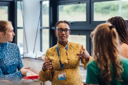 community workers discussing in circle