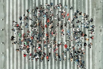 high angle view of people forming a speech bubble