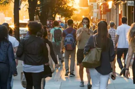 people walking in a town