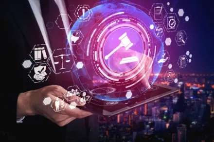 figure in suit holding a tablet with digital gavel on top