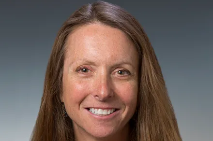 headshot of woman with long hair