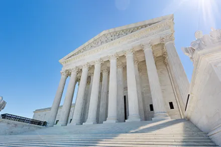 exterior of U.S. Supreme Court building on sunny day